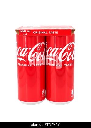 ROME, ITALY - DECEMBER 19, 2023. Coca-Cola pack 4x330ml cans isolated on white background. Stock Photo