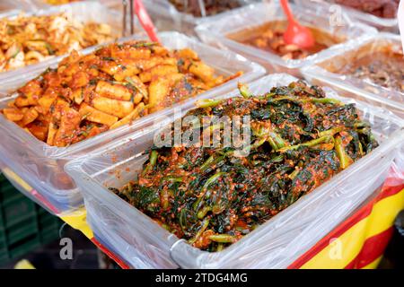 Gat kimchi on display at a side dish shop in a traditional market in Korea Stock Photo