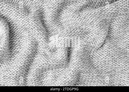 Gray wrinkled fabric texture background. Black and White. Close up