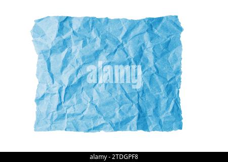 Blue crumpled rectangle sheet of paper with torn edge isolated on white background. Recycled craft paper wrinkled, creased texture, grunge border. Tem Stock Photo