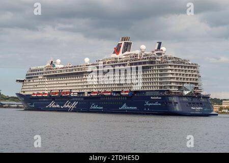 The Mein Schiff 6 (TUI Cruises) sailing away from the Cruise Terminal Ostseekai, Kiel, Germany. Stock Photo