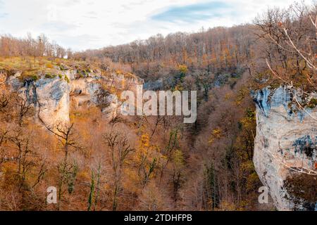 Forested mountains and a gorge below. Lago Naki plateau in autumn. Beautiful natural landscape. Stock Photo