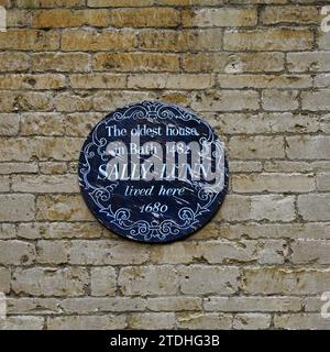 Wall plaque outside Sally Lunn's Eating House, Bath reputedly oldest house in Bath 1482. December 2023 Stock Photo