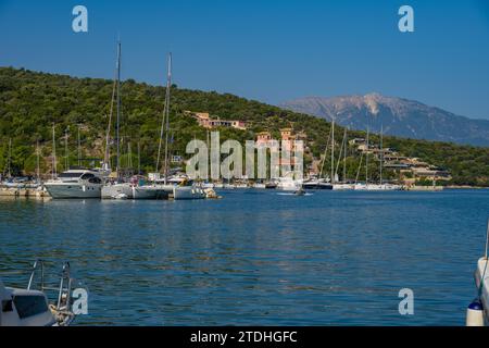 Yachts moored in the harbour of Vathi on the island of Meganisi in the Ionian Sea Stock Photo