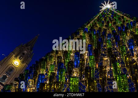 In the coronavirus year 2021, the nativity village had to be canceled. Project manager of Bethlehem f'Għajnsielem Franco Ciangura had his village collect bottles instead and created a now award-winning Christmas tree made from used glass and metal in Mġarr, Malta Stock Photo