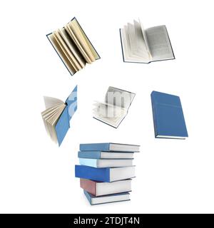 Books flying over stack on white background Stock Photo