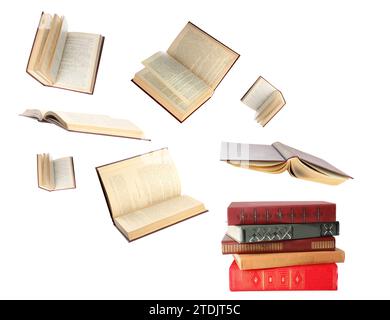 Books flying over stack on white background Stock Photo