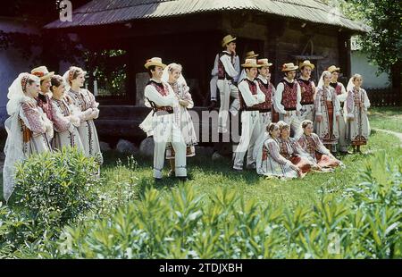 Socialist Republic of Romania, approx. 1979. Group of performers wearing beautiful traditional national costumes. Stock Photo