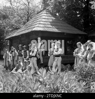 Socialist Republic of Romania, approx. 1979. Group of performers wearing beautiful traditional national costumes. Stock Photo