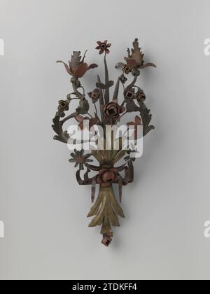 Wall arm, whose arms and candle holders are designed as flower branches, anonymous, c. 1700 - c. 1750 An iron forged altar bouquet. Painted with the original colors.  iron (metal) forging An iron forged altar bouquet. Painted with the original colors.  iron (metal) forging Stock Photo