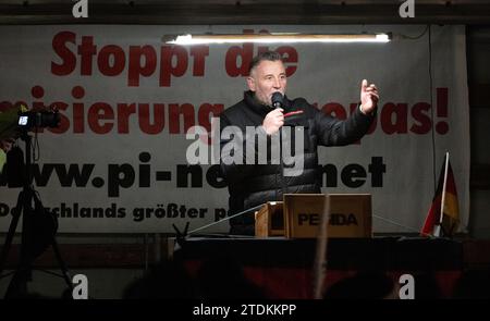 Dresden, Germany. 18th Dec, 2023. Pegida founder Lutz Bachmann speaks at a rally of the right-wing extremist movement Pegida on Schlossplatz. Credit: Robert Michael/dpa/Alamy Live News Stock Photo