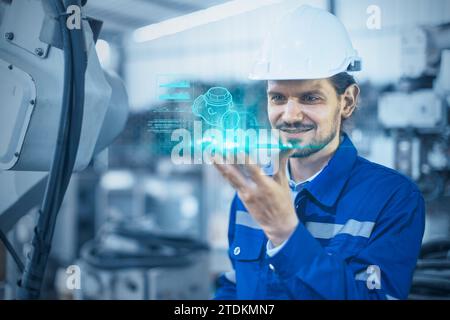 Engineer male exciting with modern hologram display device showing engineering product model information detail using laser holographic 3d technology. Stock Photo