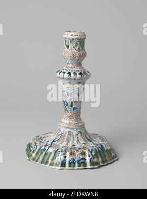Candlestick with multicolored painting, c. 1690 Faïence candlestick, multi -colored painted under the glaze. Eight -sided foot, scanned trunk. Unnoticed. Delft . Faïence candlestick, multi -colored painted under the glaze. Eight -sided foot, scanned trunk. Unnoticed. Delft . Stock Photo