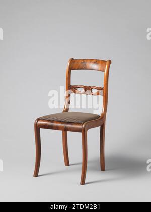 Chair with Swans, Anonymous, 1830 Chair from a set of ten chairs and four arm chairs of partly solid and partly glued mahogany on elm core. Loose covered seats. The square hind legs areas backwards. Nine chairs and an armchair have square, slightly rounded at the front, front legs; The rest has round articulated front legs. The stretched S-shaped backs have a sculpted intermediate rule with a palmet flanked by two swans bending back with the necks. The flat volute -shaped armrests run high in the back. Northern Netherlands wood (plant material). mahogany (wood). elm (wood). textile materials C Stock Photo