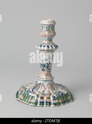 Candlestick with multicolored painting, c. 1690 Faïence candlestick, multi -colored painted under the glaze. Eight -sided foot, scanned trunk. Unnoticed. Delft . Faïence candlestick, multi -colored painted under the glaze. Eight -sided foot, scanned trunk. Unnoticed. Delft . Stock Photo
