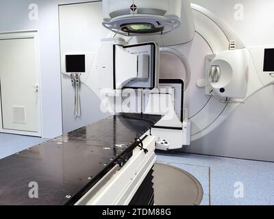 Medical advanced linear accelerator in oncological cancer therapy in a modern hospital. Stock Photo