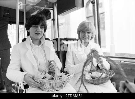 Haarlem flower girls in new NZH bus, 29-03-1979, Whizgle News from the Past, Tailored for the Future. Explore historical narratives, Dutch The Netherlands agency image with a modern perspective, bridging the gap between yesterday's events and tomorrow's insights. A timeless journey shaping the stories that shape our future Stock Photo