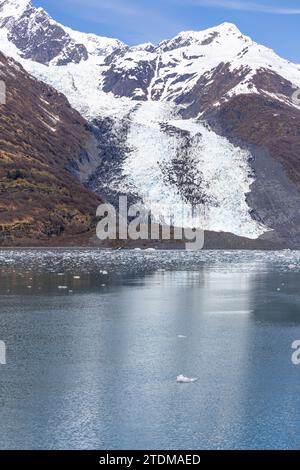 Tidewater Glacier reflected in the calm waters of College Fjord, Alaska, USA Stock Photo