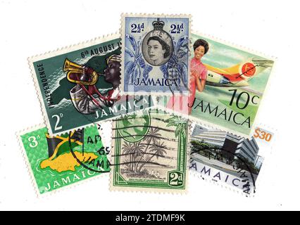 A montage of vintage postage stamps from Jamaica on a white background. Stock Photo