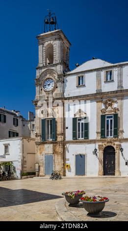 August 18, 2023 - Martina Franca, Taranto, Puglia, Italy. Village with baroque architecture. The University Palace, with the bell tower, in  Piazza Pl Stock Photo