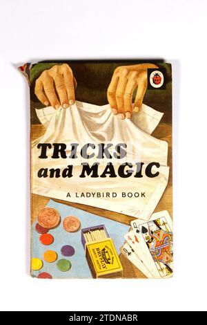 vintage 1960s ladybird book tricks and magic isolated on white studio background Stock Photo