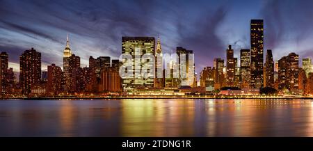 New York City panoramic evening view of Midtown Manhattan skyline from ...
