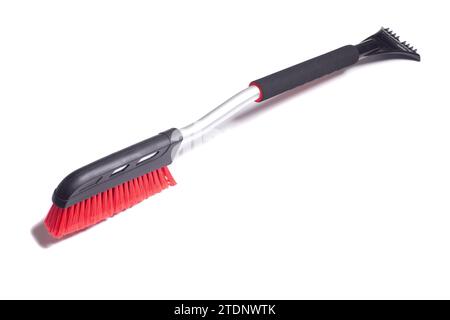 Car brush with a scraper for cleaning the car in winter about snow and ice, isolated on white Stock Photo