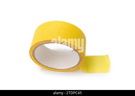 Roll of yellow masking tape on white background. Stock Photo