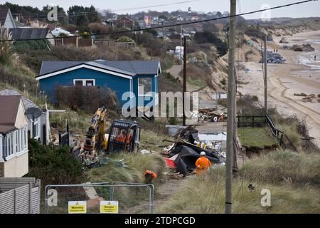 Homes On Cliff-edge Due To Erosion. Fairlight Cove, East Sussex, UK ...