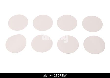 Round white stickers, blank tags labels isolated on a white background. Top view. Stock Photo