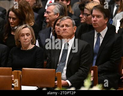 Washington, United States. 19th Dec, 2023. Supreme Court Chief Justice John Roberts (C), his wife Jane Sullivan and Supreme Court Associate Justice Brett Kavanaugh (R) attend the memorial service for former Supreme Court Justice Sandra Day O'Connor at the National Cathedral in Washington, DC, on December 19, 2023. O'Connor, who was the first woman to serve on the court, died December 1 at the age of 93. Pool photo by Jim Watson/UPI Credit: UPI/Alamy Live News Stock Photo