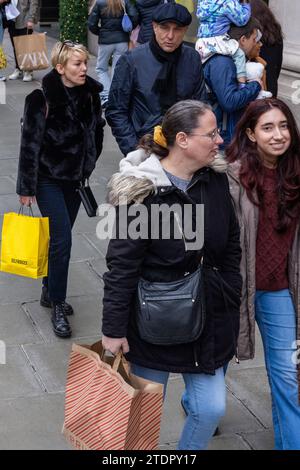 London, UK. 18th December, 2023. Actor and former professional footballer Vinnie Jones is pictured among shoppers outside department store Selfridges on Oxford Street a week before Christmas Day. Some retail analysts are predicting improved sales in the final run-up to Christmas with a full week and weekend of trading still to come. Credit: Mark Kerrison/Alamy Live News Stock Photo