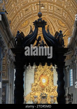 Dove, symbol of the Holy Spirit, over the cathedra Petri (chair of St Peter) in the apse of St Peter's basilica, Rome, Vatican, Italy. Stock Photo