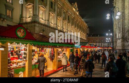 Milan Italy December 13 2023: Along the perimeter of the cathedral, the most awaited and loved market by Milanese for Christmas gifts Stock Photo