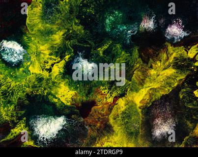 Abstract hand painted fluid or liquid art background with black and yellow colors. Acrylic painting on canvas with color gradients, splash, and wave p Stock Photo