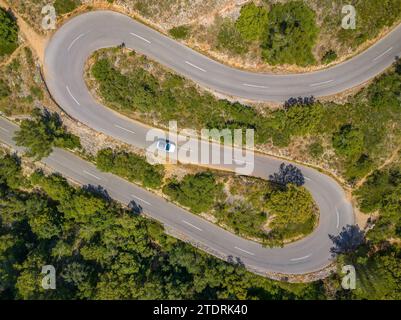 Aerial view of the curves of the road that goes up to the summit of Puig de Randa (Mallorca, Balearic Islands, Spain) Stock Photo