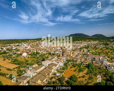Aerial view of the town of Algaida on a spring afternoon. In the background, the Puig de Randa mountain (Mallorca, Balearic Islands, Spain) Stock Photo