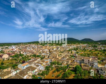Aerial view of the town of Algaida on a spring afternoon. In the background, the Puig de Randa mountain (Mallorca, Balearic Islands, Spain) Stock Photo