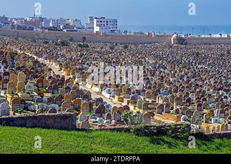 Islamic graves with headstones at the Laalou muslim cemetery with view on the Atlantic Ocean in the city Rabat, Rabat-Salé-Kénitra, Morocco Stock Photo