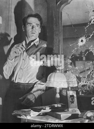 Henry Fonda stars in the film noir 'The Long Night' (1947). In this gripping drama, Fonda plays Joe Adams, a man trapped in his apartment and surrounded by police, reflecting on the events that led to his current predicament. The film is a remake of the French film 'Le Jour se Lève' and is known for its intense narrative and strong character development. Fonda's performance as Adams adds depth to the character's psychological turmoil, showcasing his ability to portray complex and nuanced roles. Stock Photo