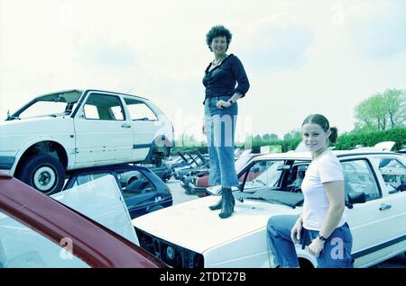 Two ladies in a junkyard, Whizgle News from the Past, Tailored for the Future. Explore historical narratives, Dutch The Netherlands agency image with a modern perspective, bridging the gap between yesterday's events and tomorrow's insights. A timeless journey shaping the stories that shape our future Stock Photo