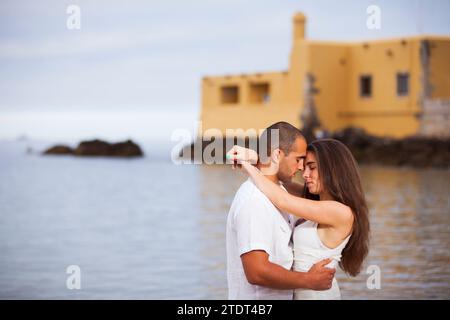 Passionate couple having fun at the beach Stock Photo