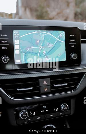 Map screen on a navigation device central console lcd in a tourism car Stock Photo