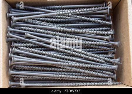 self-tapping black screw for wood Stock Photo