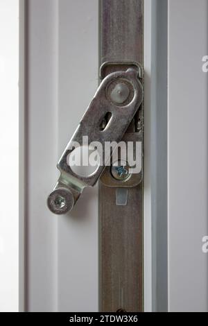 Installation of the window limiter for a plastic window, close-up Stock ...