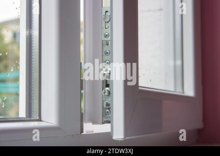 airing the room with the open window is white Stock Photo