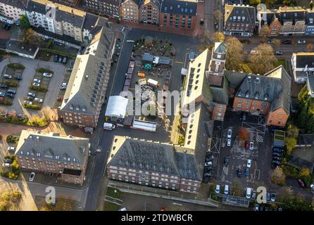 Aerial view, town hall city administration and Christmas market on Ernst-Wilczok-Platz, surrounded by autumnal deciduous trees, old town, Bottrop, Ruh Stock Photo