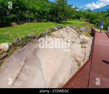 Capo di Ponte: Municipal Archaeological Park of Seradina-Bedolina, rock art sites, rock drawings in Valcamonica (Camonica Valley), petroglyphs in Bres Stock Photo