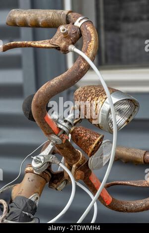 Detail of a rusting mid 20th Century bicycle at a small roadside store dealing in antiques and vintage goods in Boone, North Carolina. Stock Photo