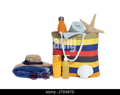 Stylish bag, starfish and other beach accessories isolated on white Stock Photo